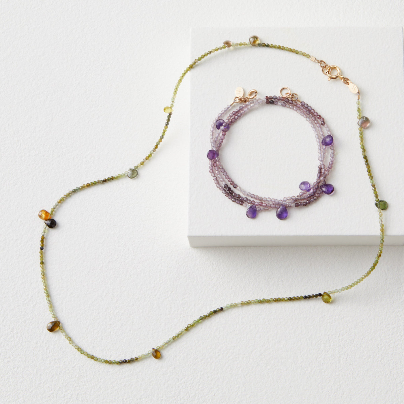 Green Tourmaline shown with Purple Amethyst & Spinel