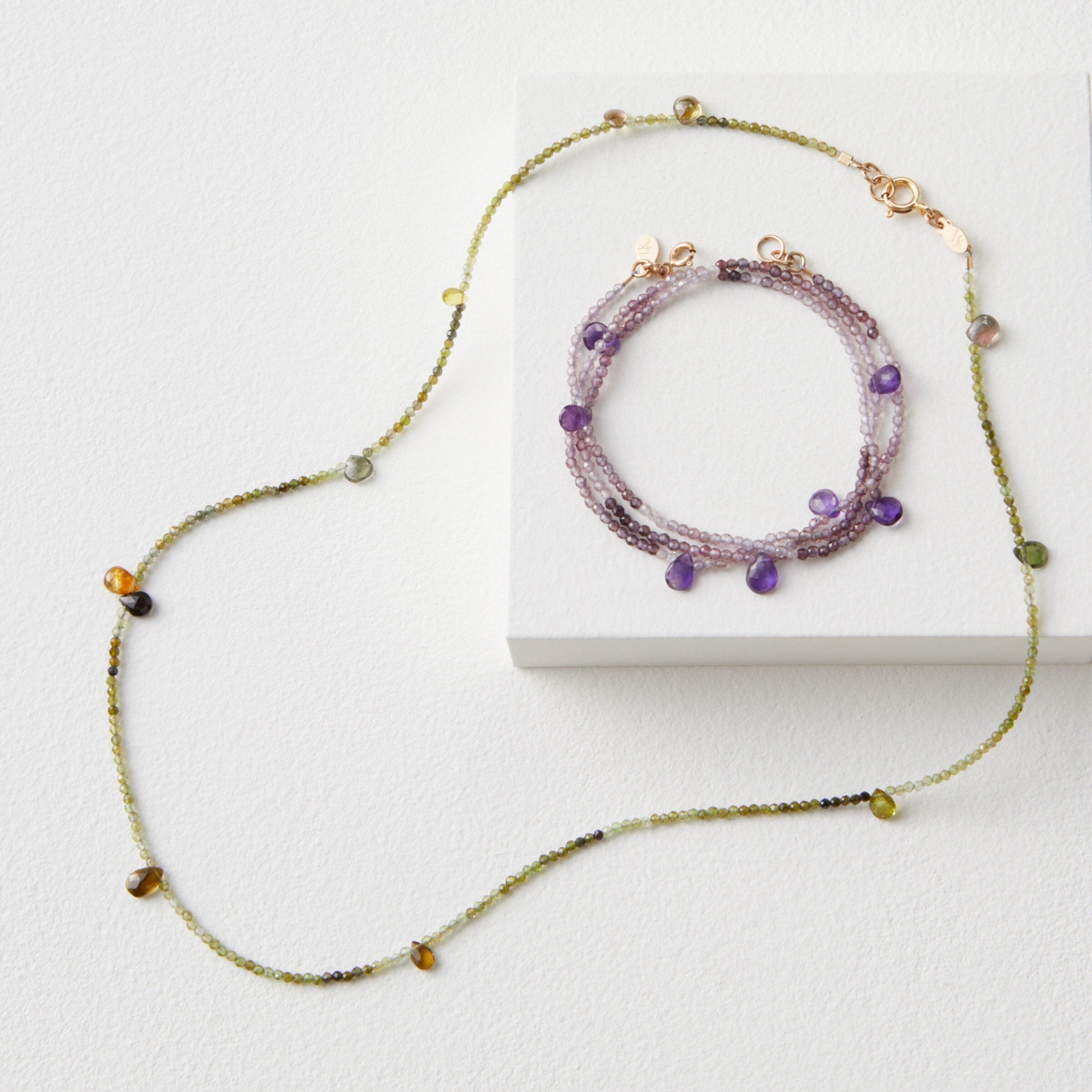 Green Tourmaline shown with Purple Amethyst & Spinel