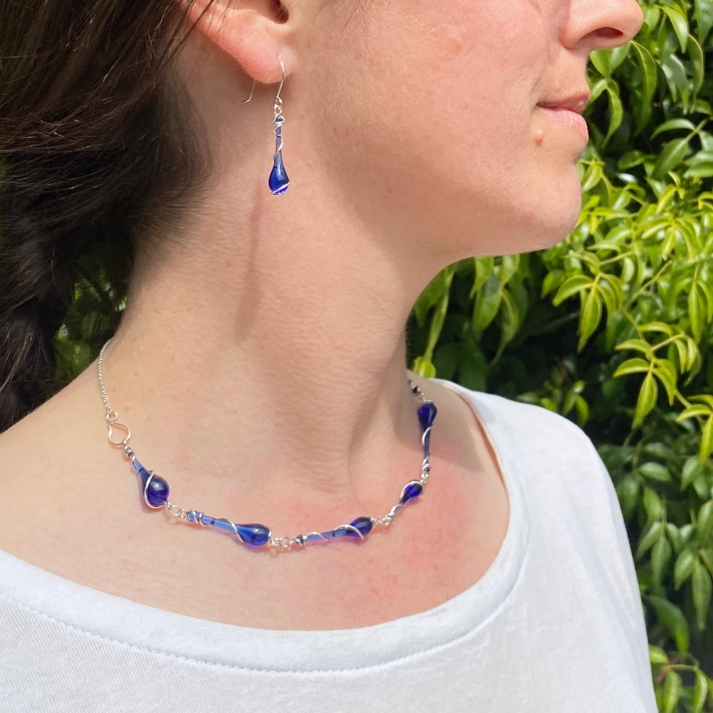 Cobalt, shown with the Serpens Choker Necklace