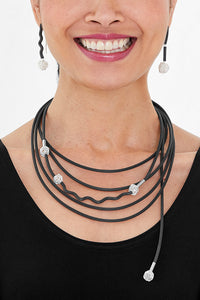 shown with the little silver knots necklace