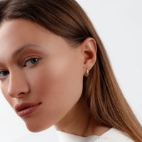 Marquita Oculus Huggie Earrings
