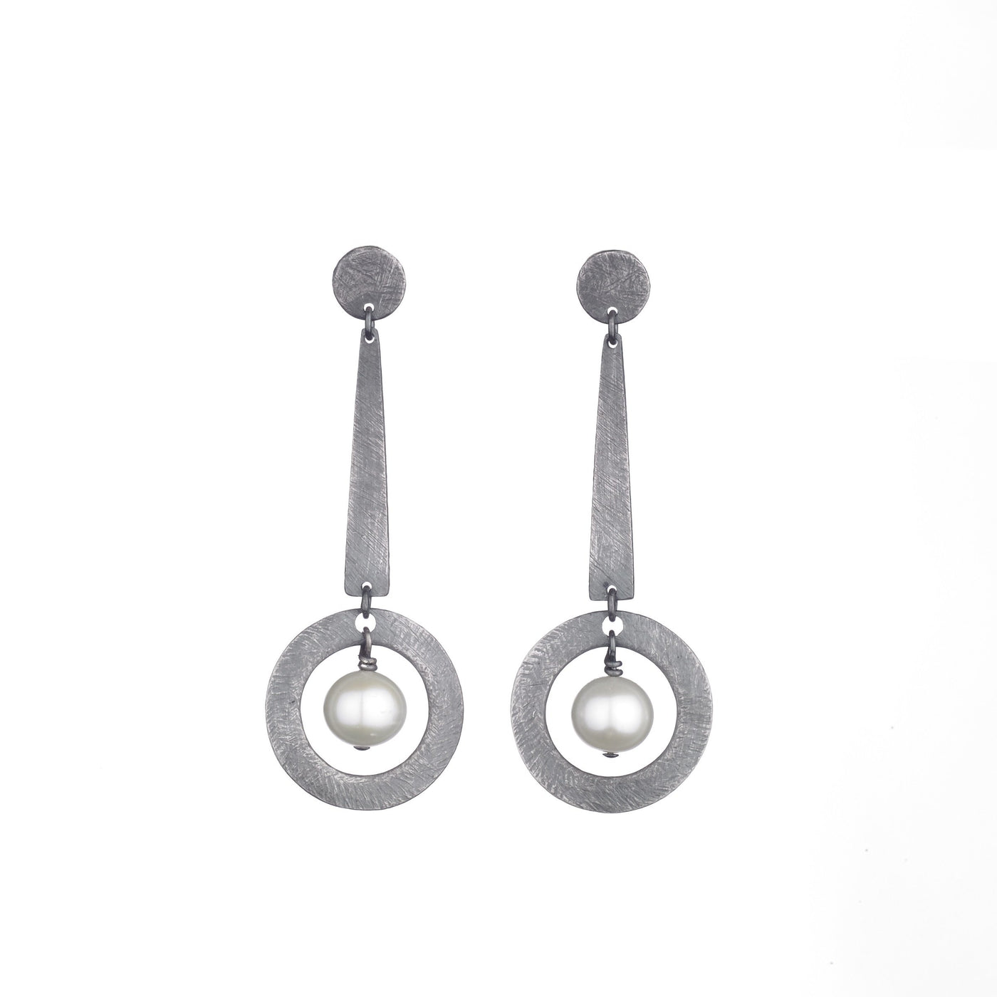 Carved Long Circle Dangle Earrings | Photo by Marty Doyle