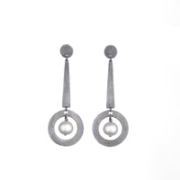 Carved Long Circle Dangle Earrings | Photo by Marty Doyle