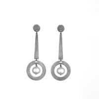 Carved Long Circle Dangle Earrings | Photo by Marty Doyle