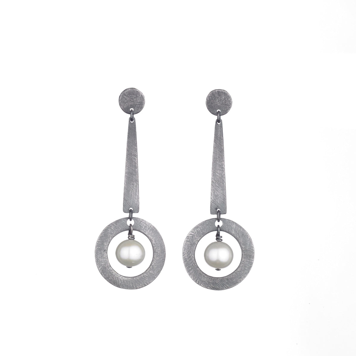 Carved Long Circle Dangle Earrings | Photo by Marty Doyle