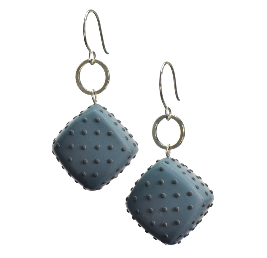 Dark teal with dots