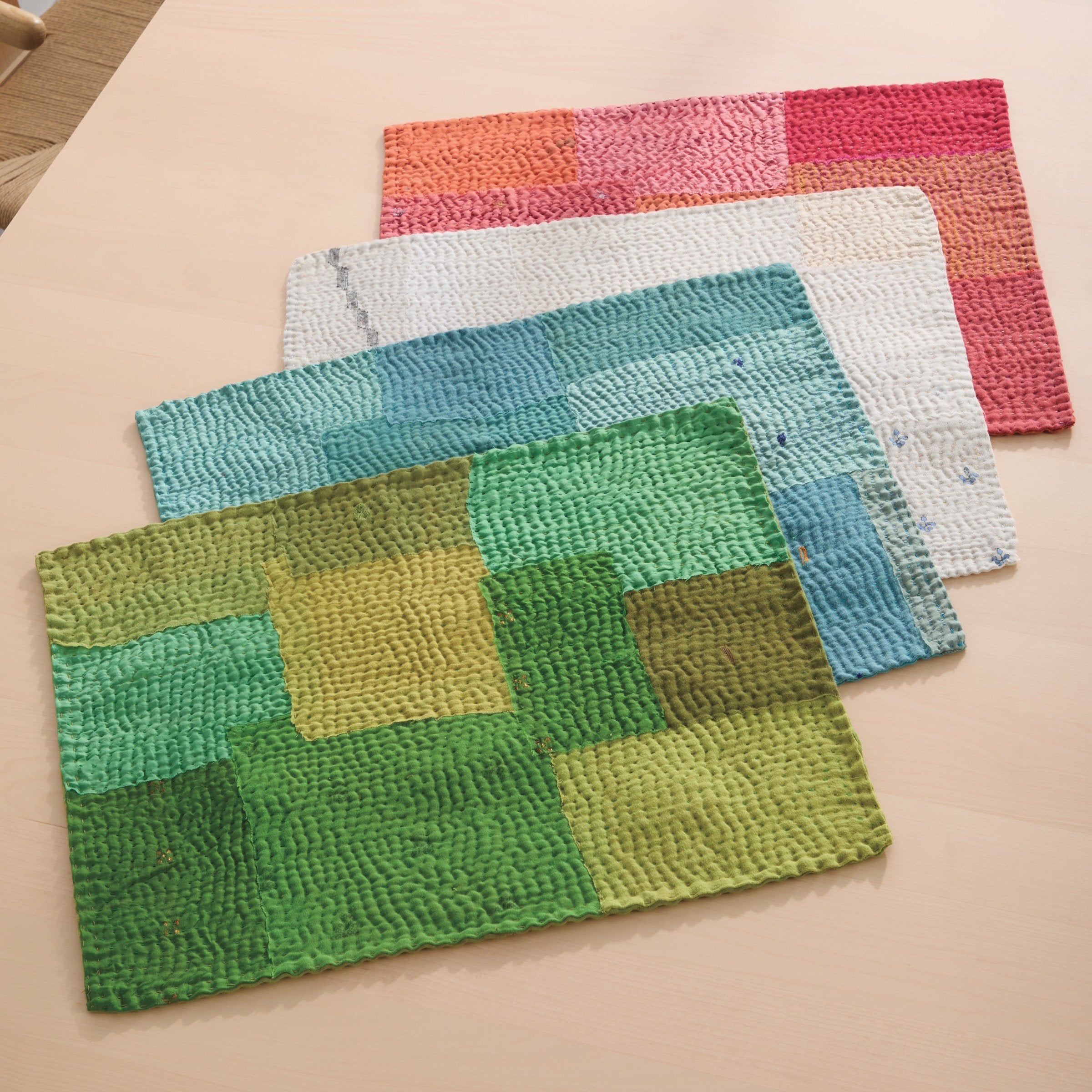 top to bottom of stack: lime green, cornflower, cauliflower, carrot