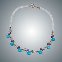 Turquoise, Crystal Quartz, Garnet & Light Blue Topaz Necklace