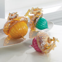clockwise from left: brilliant gold, lagoon, gold ruby