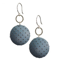Dark teal with dots
