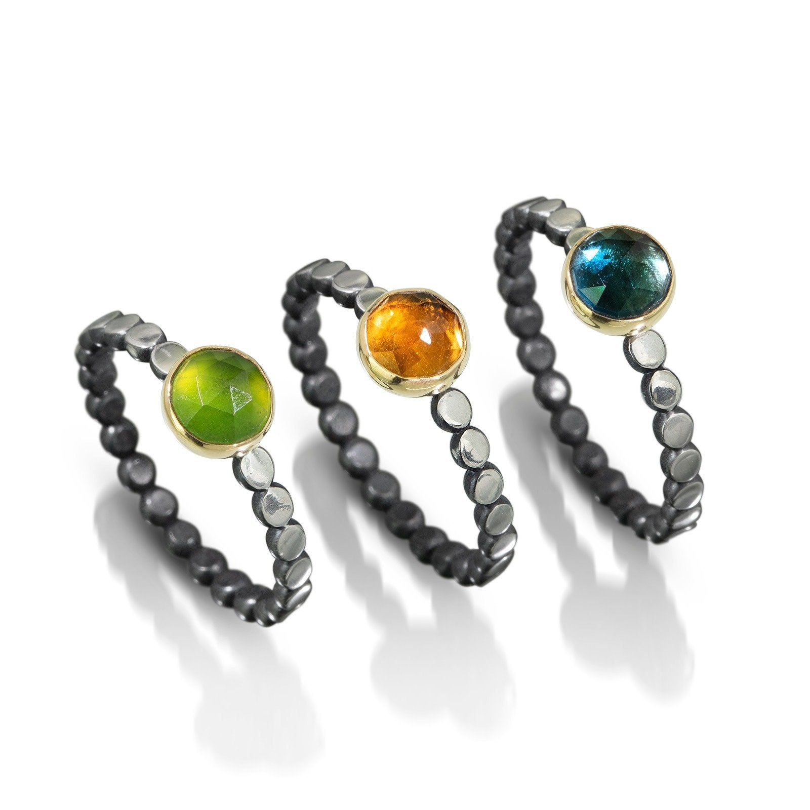 Gemstone Solitaire Rings: (left to right) Serpentine, Citrine, Blue Topaz