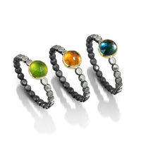 Gemstone Solitaire Rings: (left to right) Serpentine, Citrine, Blue Topaz