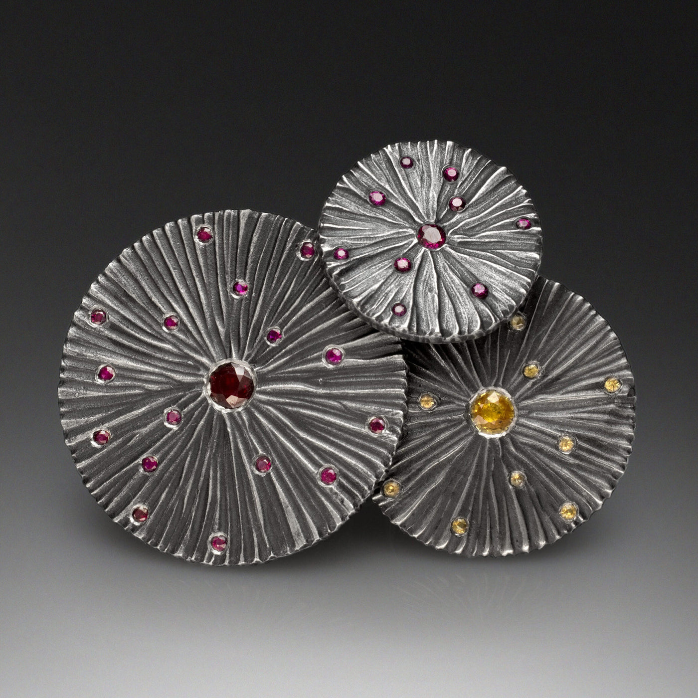 Large, Ruby, shown on the left