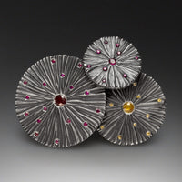Large, Ruby, shown on the left