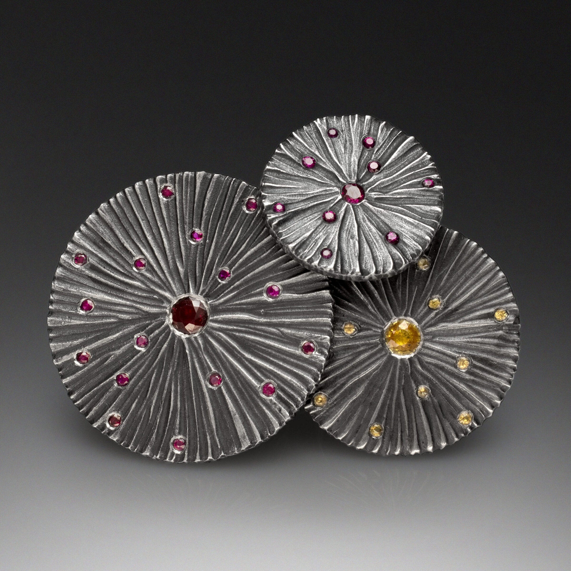 Large, Ruby, shown on the left