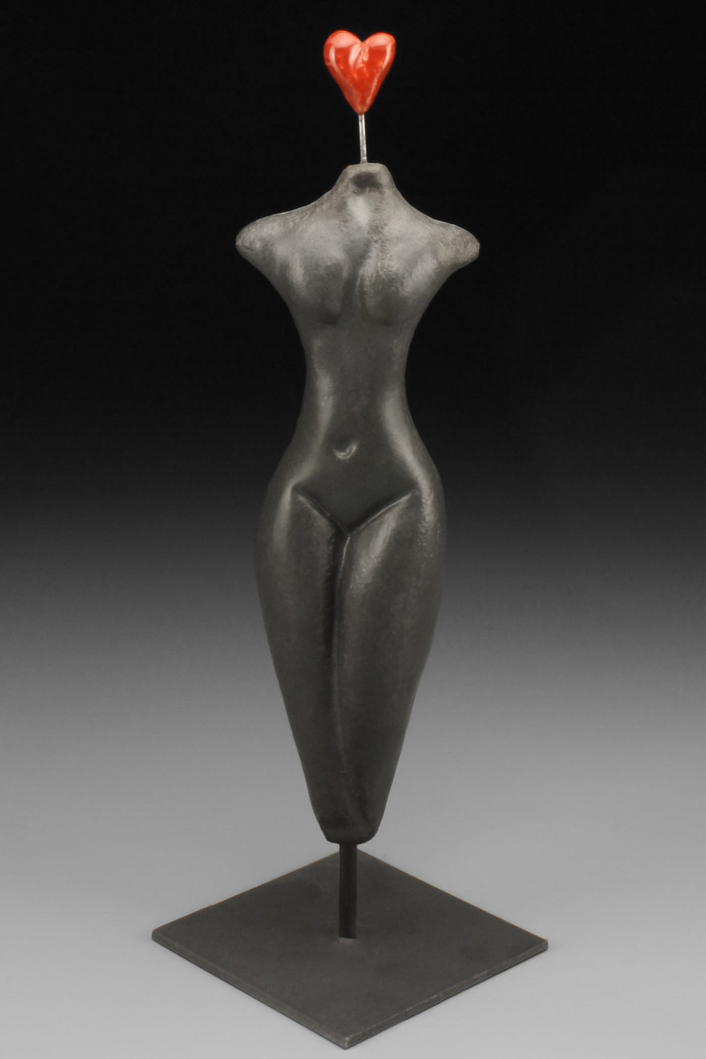 Figure on stand, Exuberant Heart