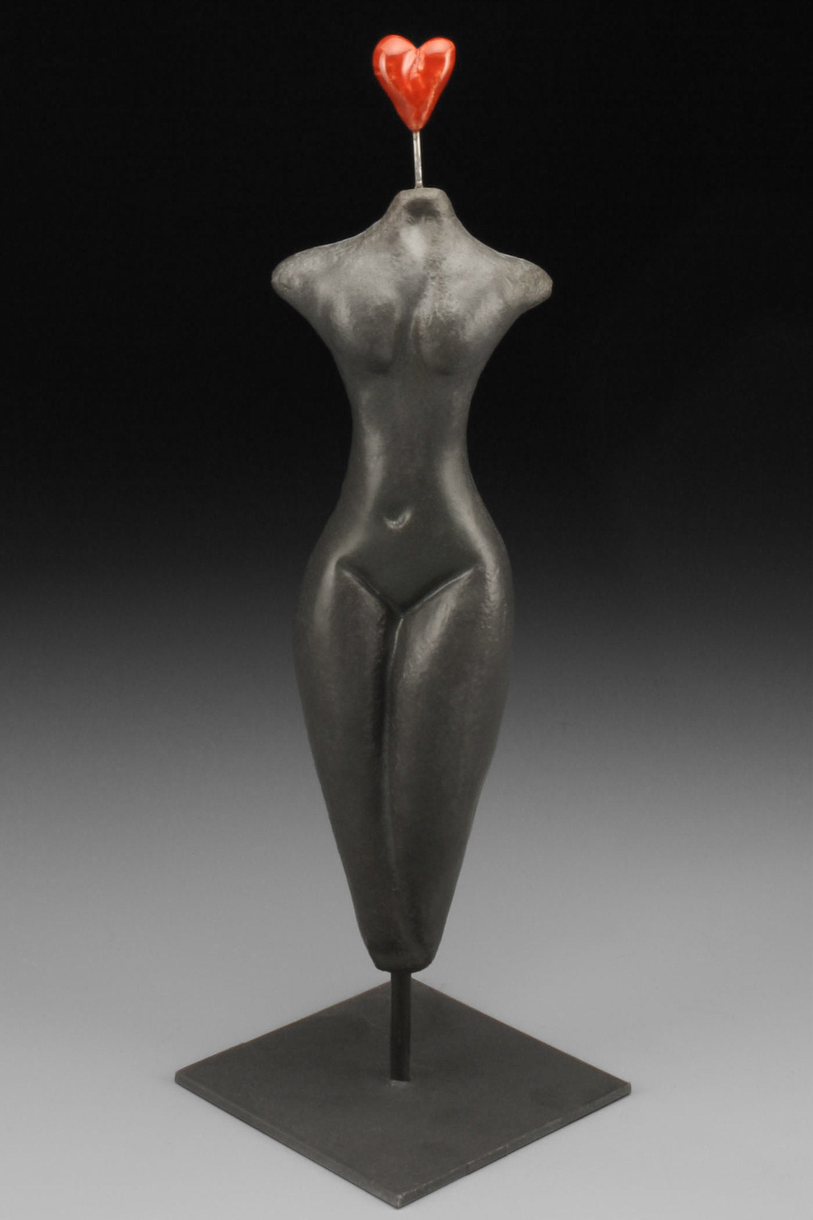 Figure on stand, Exuberant Heart