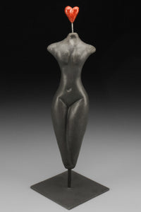 Figure on stand, Exuberant Heart