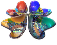 clockwise from top: ruby, sapphire, emerald, amber