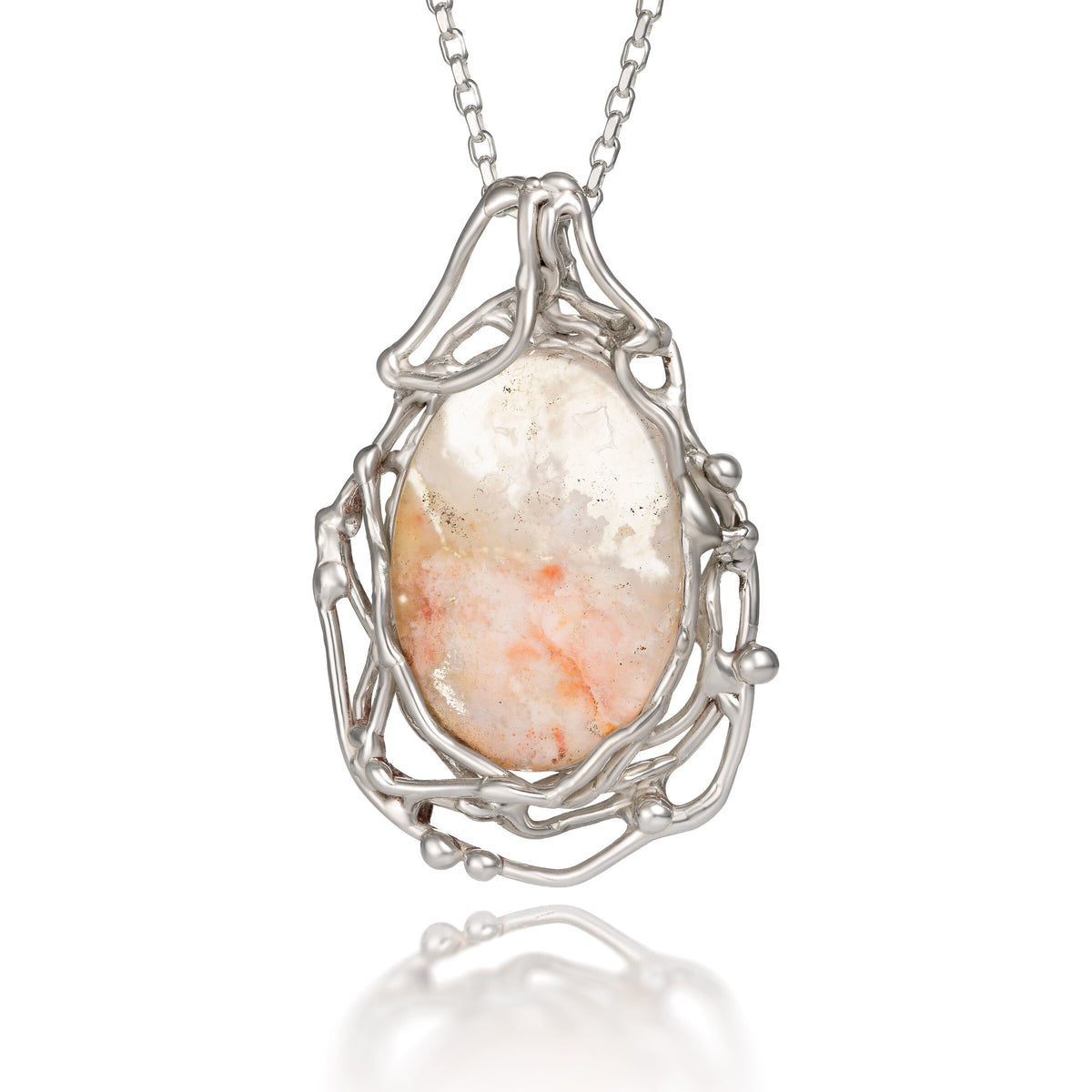 Plume Agate Pendant | Photo by Berlian Arts