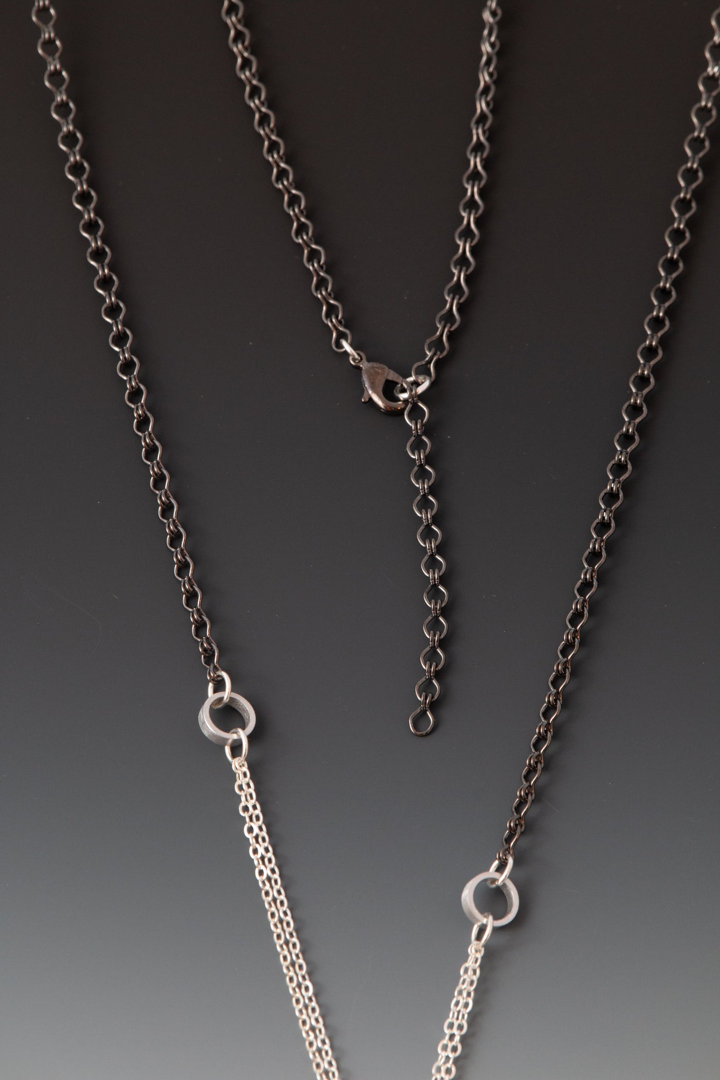 chain detail, clasp, and extender