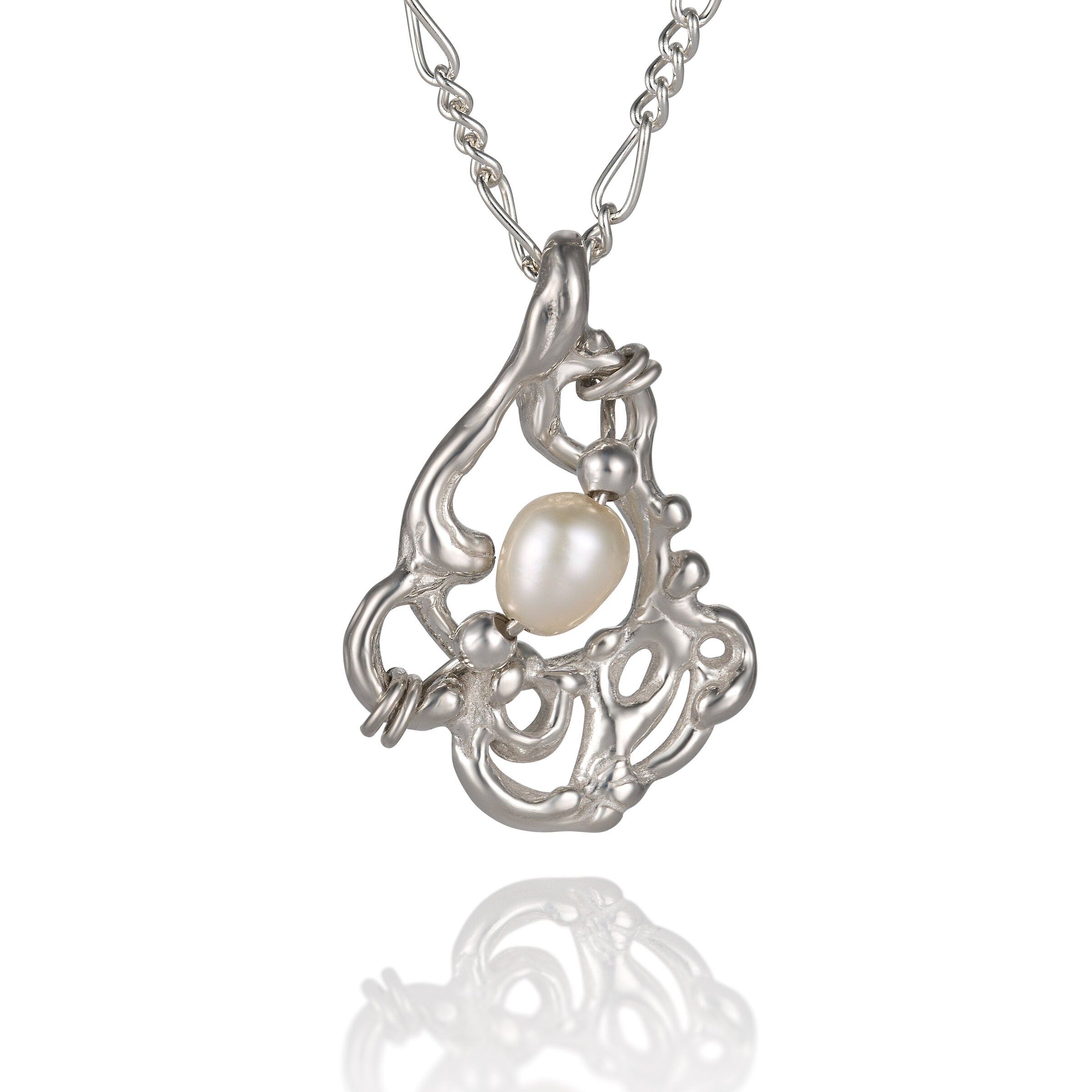 White Freshwater Pearl | Photo by Berlian Arts