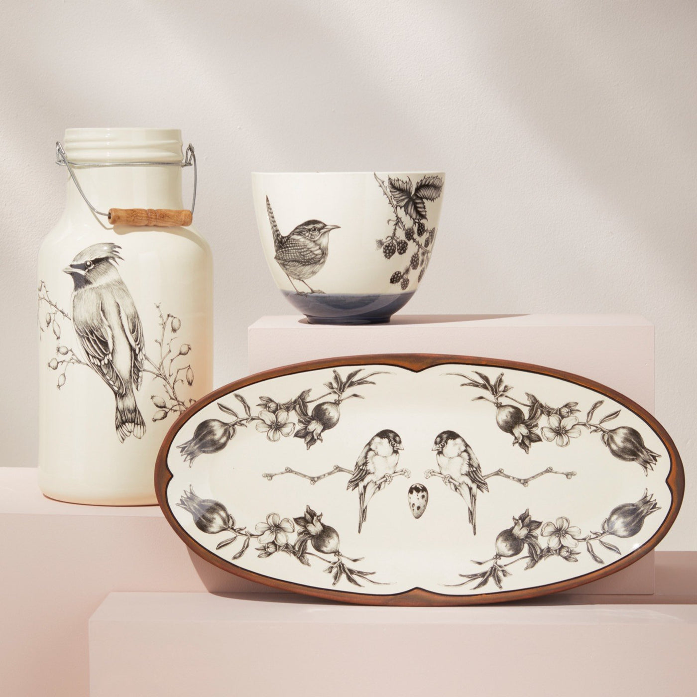 Waxwing jug with handle, carolina wren bowl, chickadee platter
