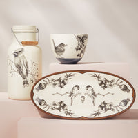Waxwing jug with handle, carolina wren bowl, chickadee platter
