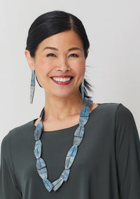 blue, shown with pyramid earrings
