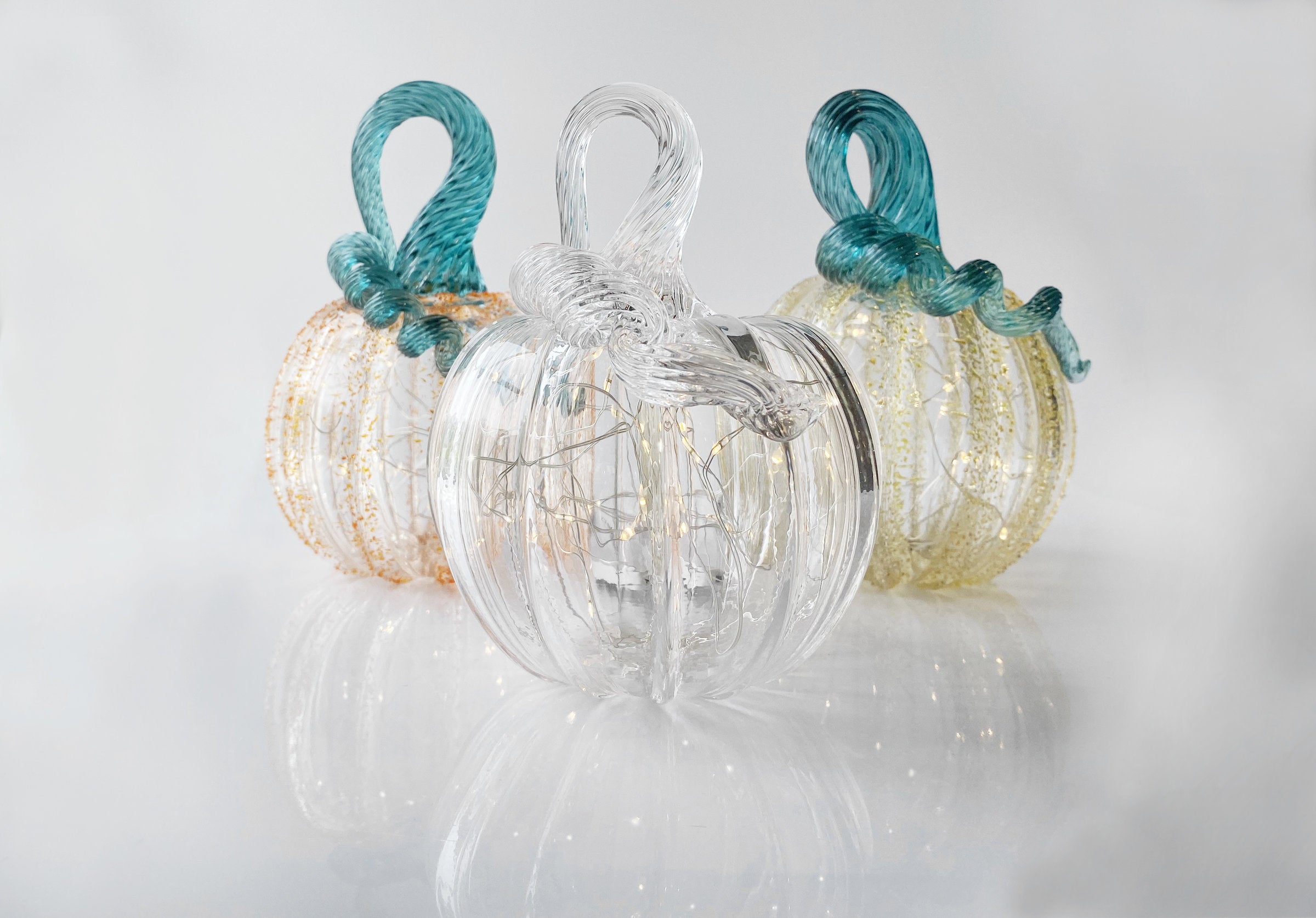 left to right: orange, crystal clear, iris gold