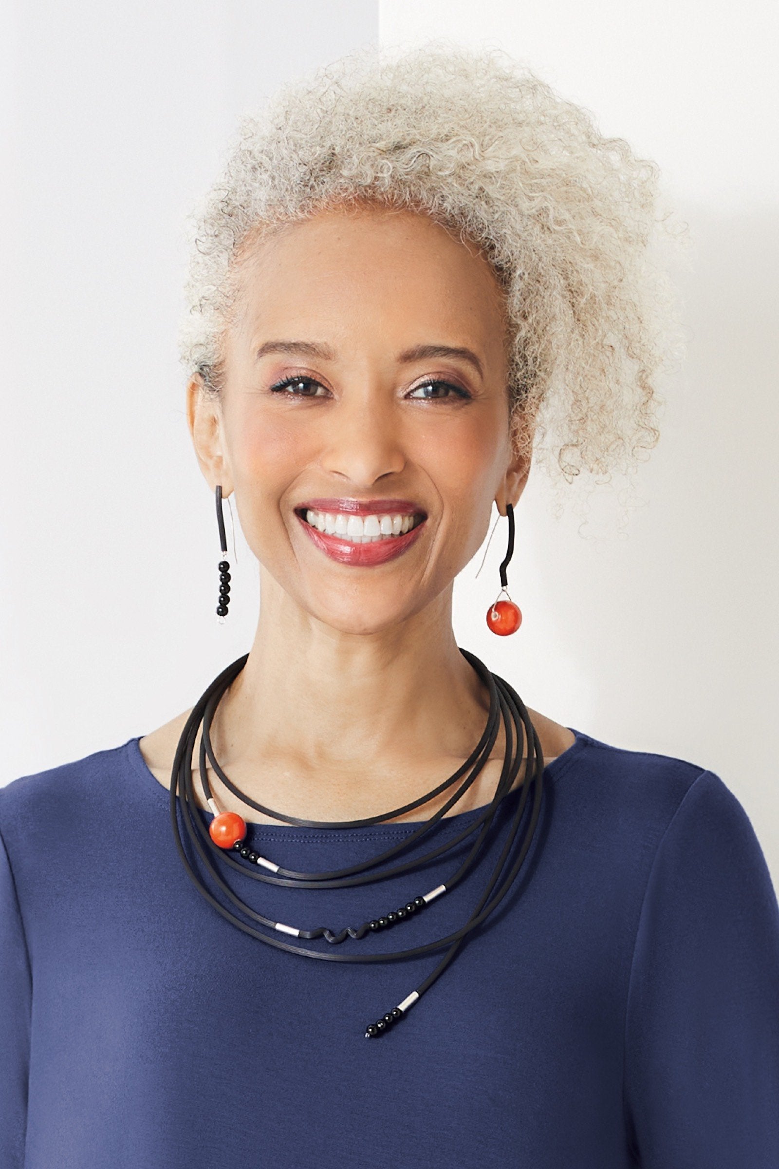 shown with the playful persimmon earrings
