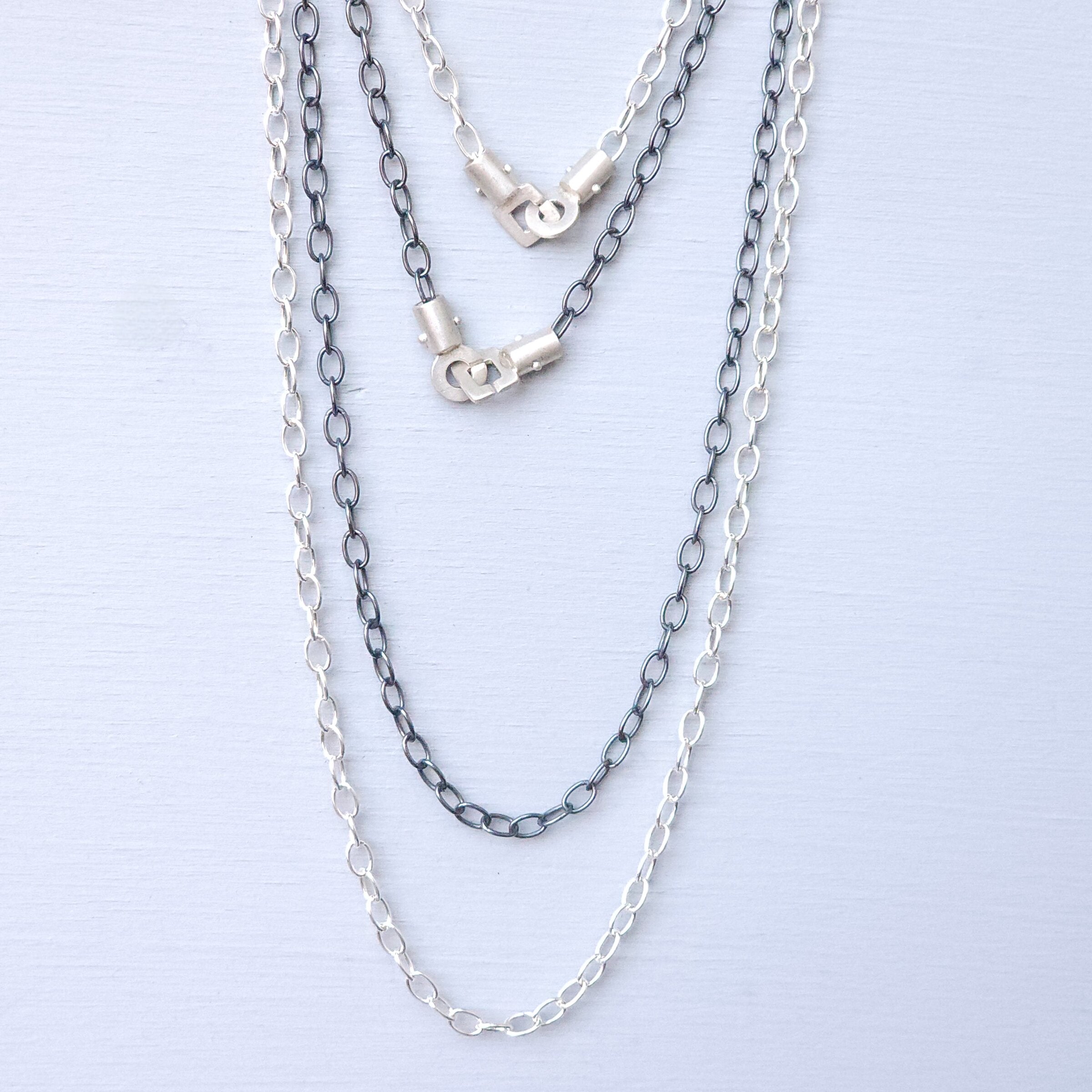 Oxidized silver chain and bright silver chain