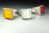 left to right: yellow traffic light, coke bottle, red traffic light