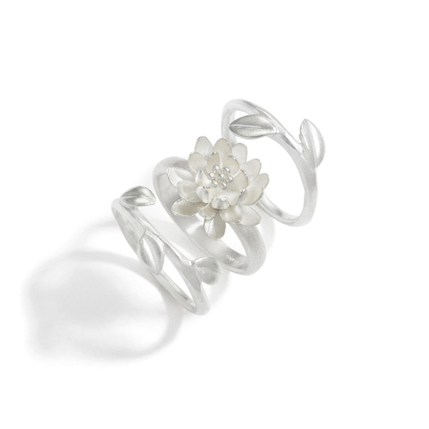 shown with the artist's silver waterlily ring in size small