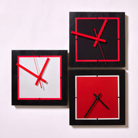 clockwise from left:  silver with red border and hands, onyx with red border and hands, red orange sapphire with silver border and black hands | Photo by Steve Smith Photography