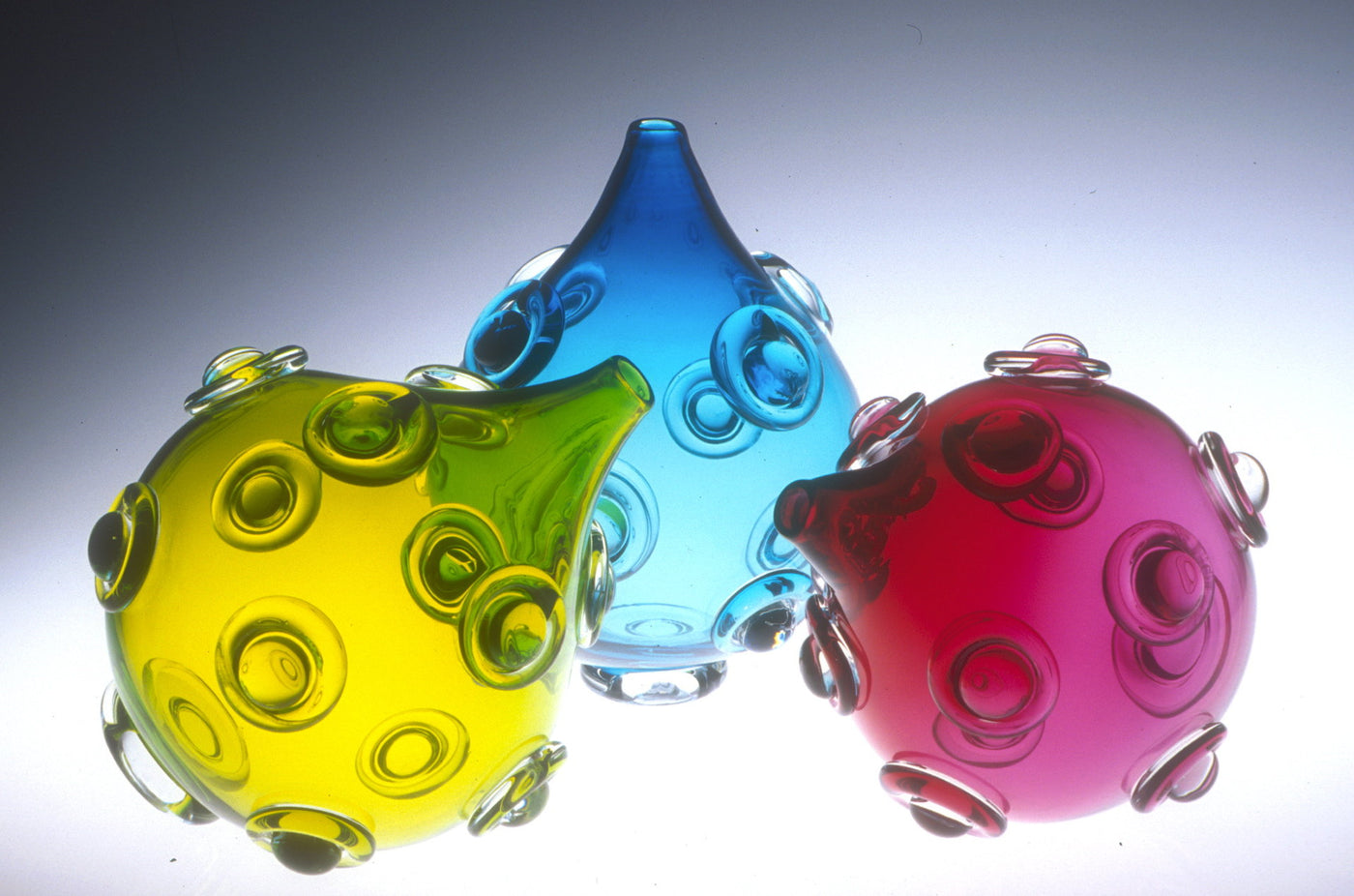 left to right: lime green, aquamarine, ruby
