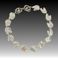 Doves Always Travel In Circles Necklace