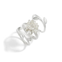 shown with the artist's double leaf ring and silver waterlily ring
