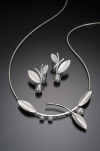 Bright Silver, shown with the artist's coordinating alternating leaf earring with pearl