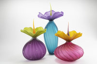 left to right: plum hyacinth lima, tall sea green, ruby urchin