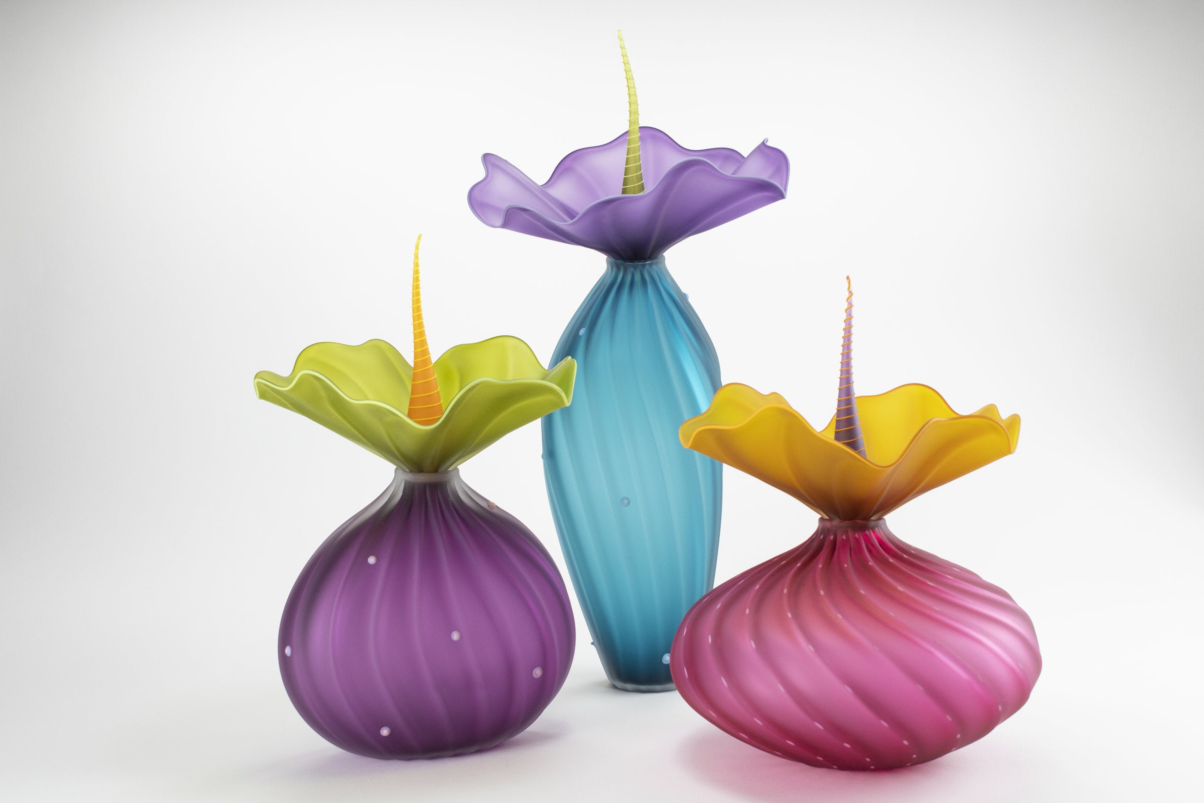 left to right: plum hyacinth lima, tall sea green, ruby urchin