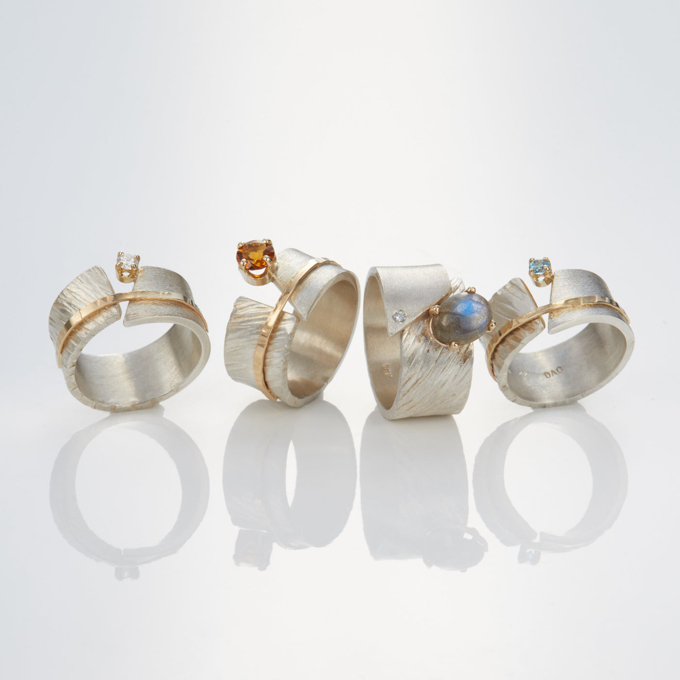 shown with the artist's between you and me rings