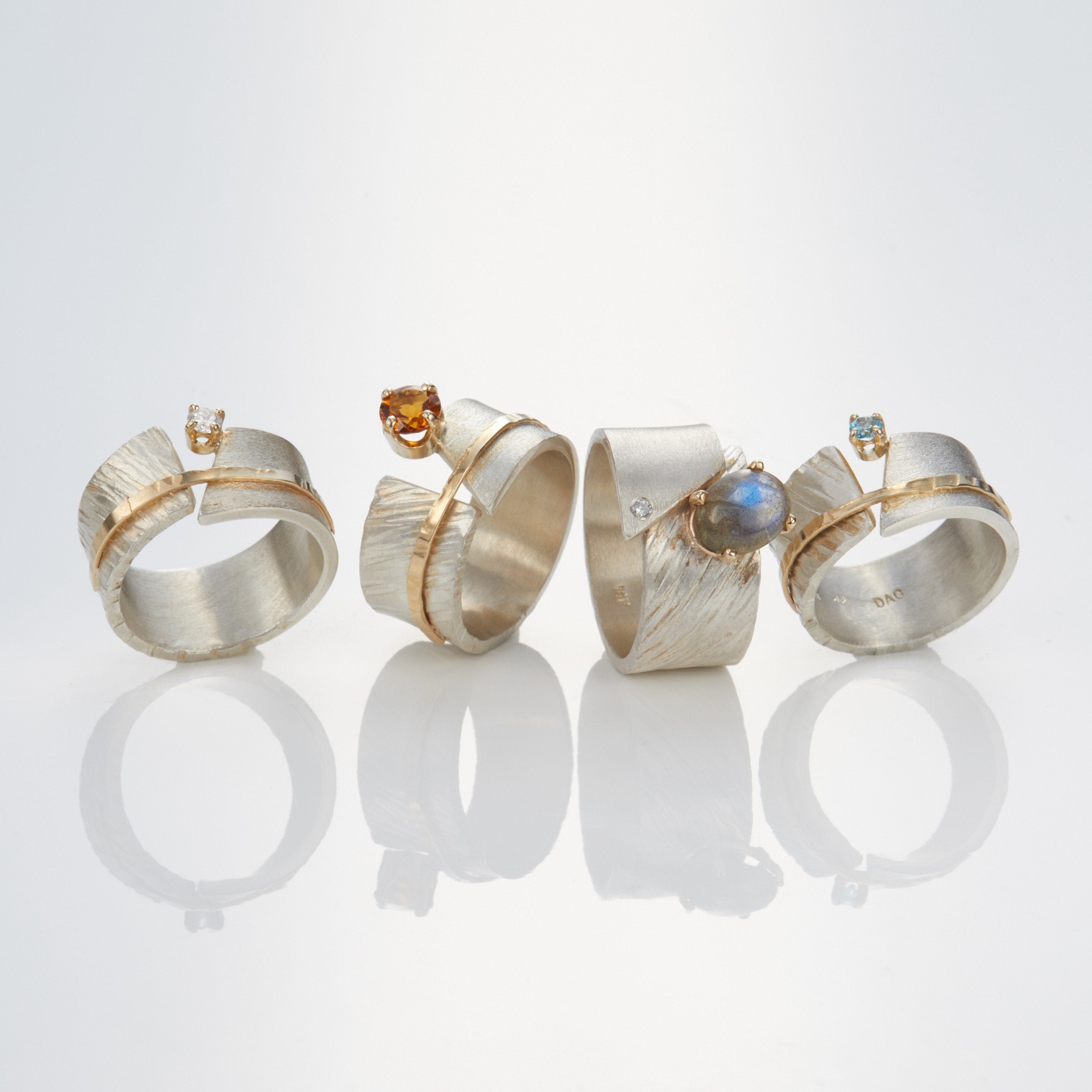 shown with the artist's between you and me rings
