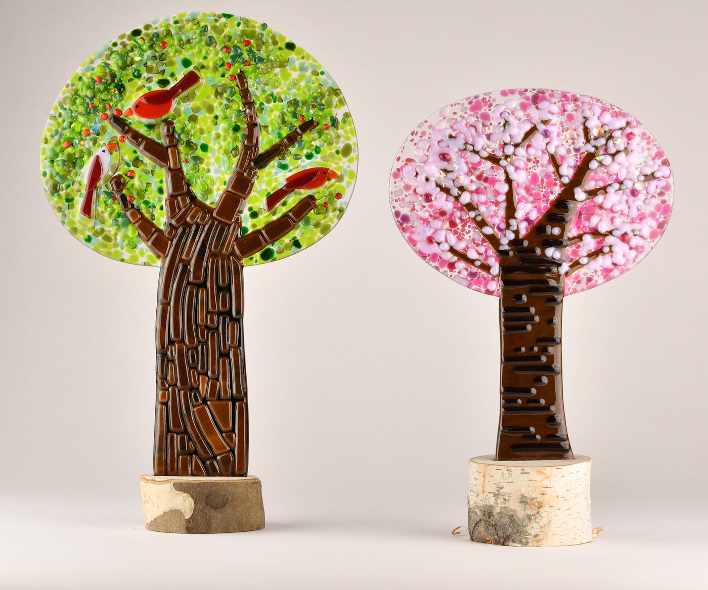 left to right: birdberry tree, blush blossoms tree