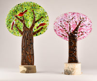 left to right: birdberry tree, blush blossoms tree