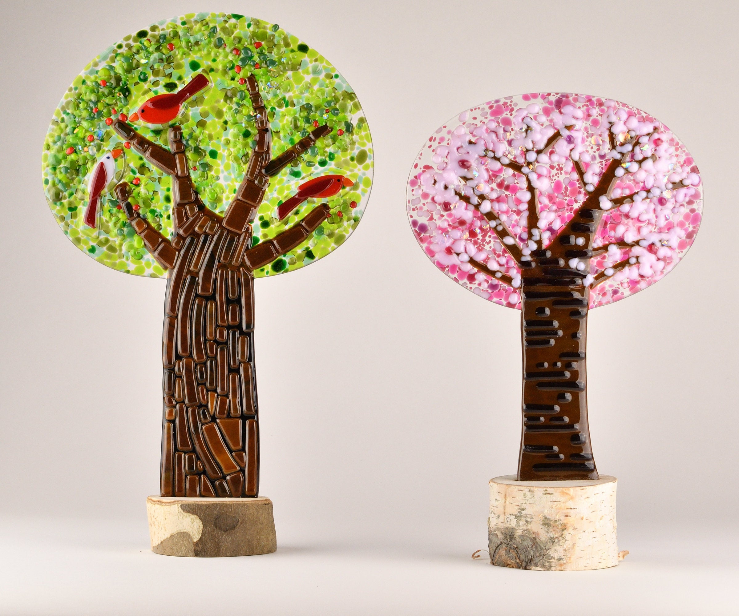 left to right: birdberry tree, blush blossoms tree