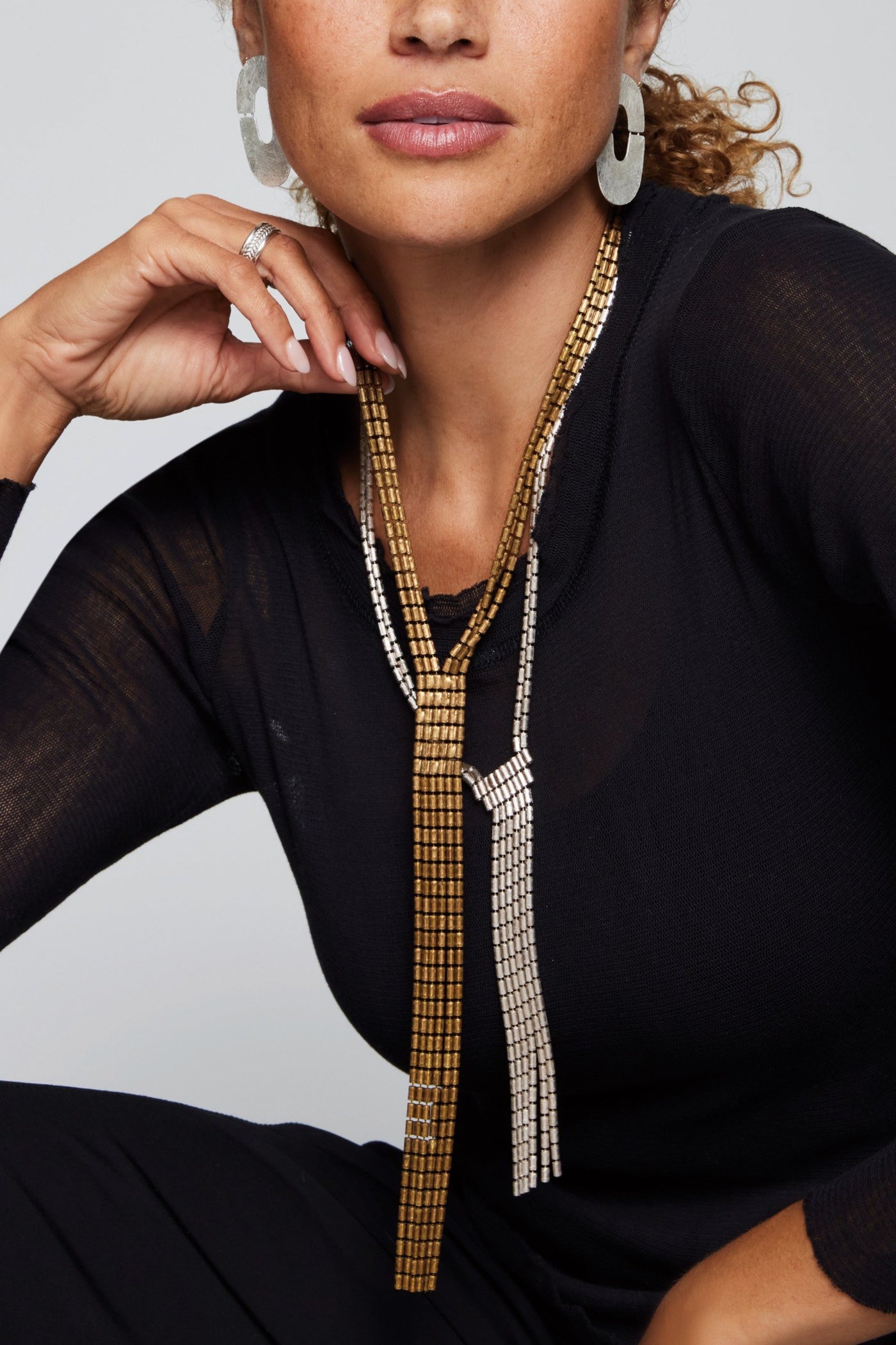 Antique Brass, shown with the Tassel Fringe Necklace in silver-plate
