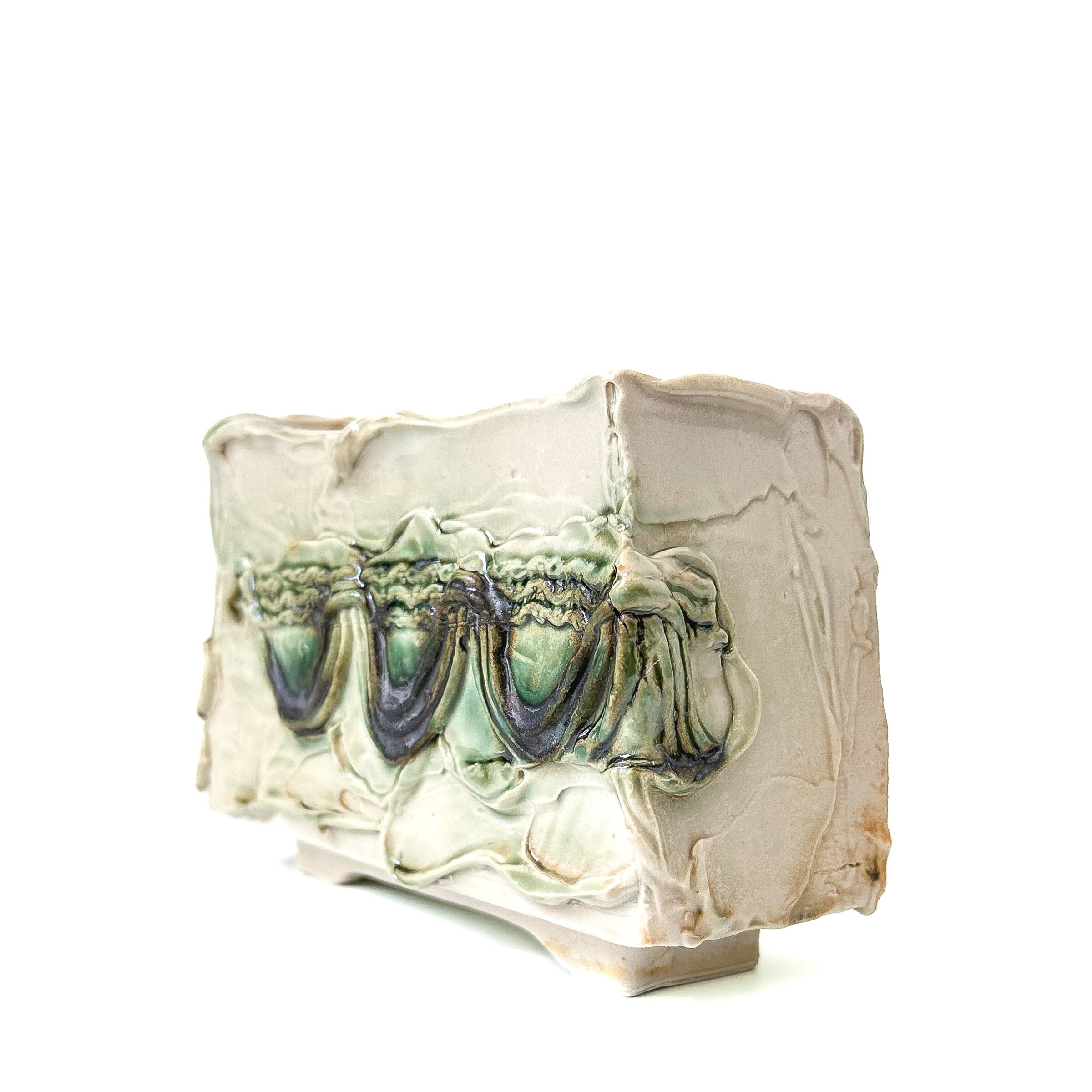 Swag Footed Slip Vase