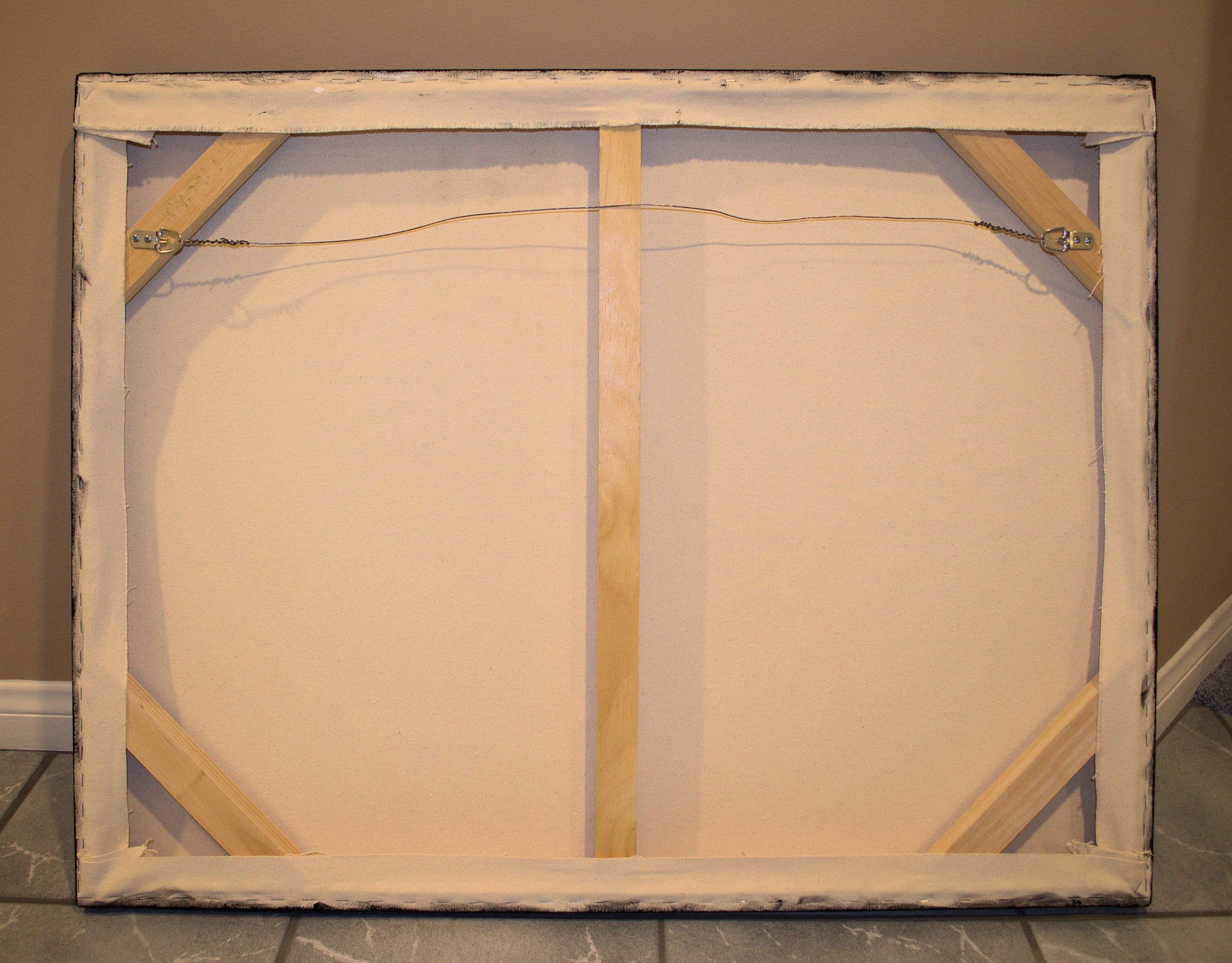 Fissure back of canvas