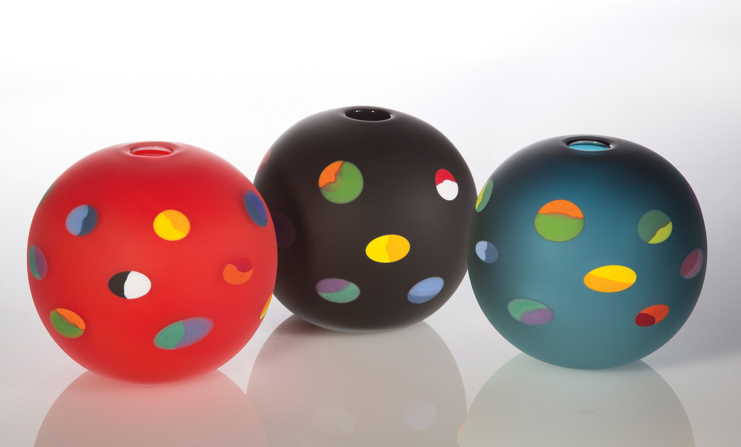 left to right: black, red, teal